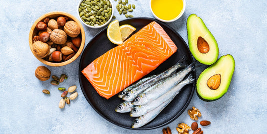 salmon, makerel, avocado and more natural ingredients on a plate